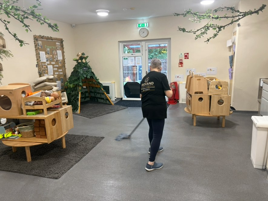 Provand cleaner mopping a nursery floor